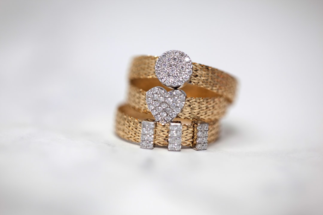 three-gold-colored-studded-rings-zzlhoewgcem